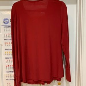 Women’s White House Black Market red size large blouse.